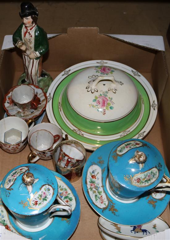 A pair of Sevres style chocolate cups and saucers and other small ceramics and a Gin/Water figure